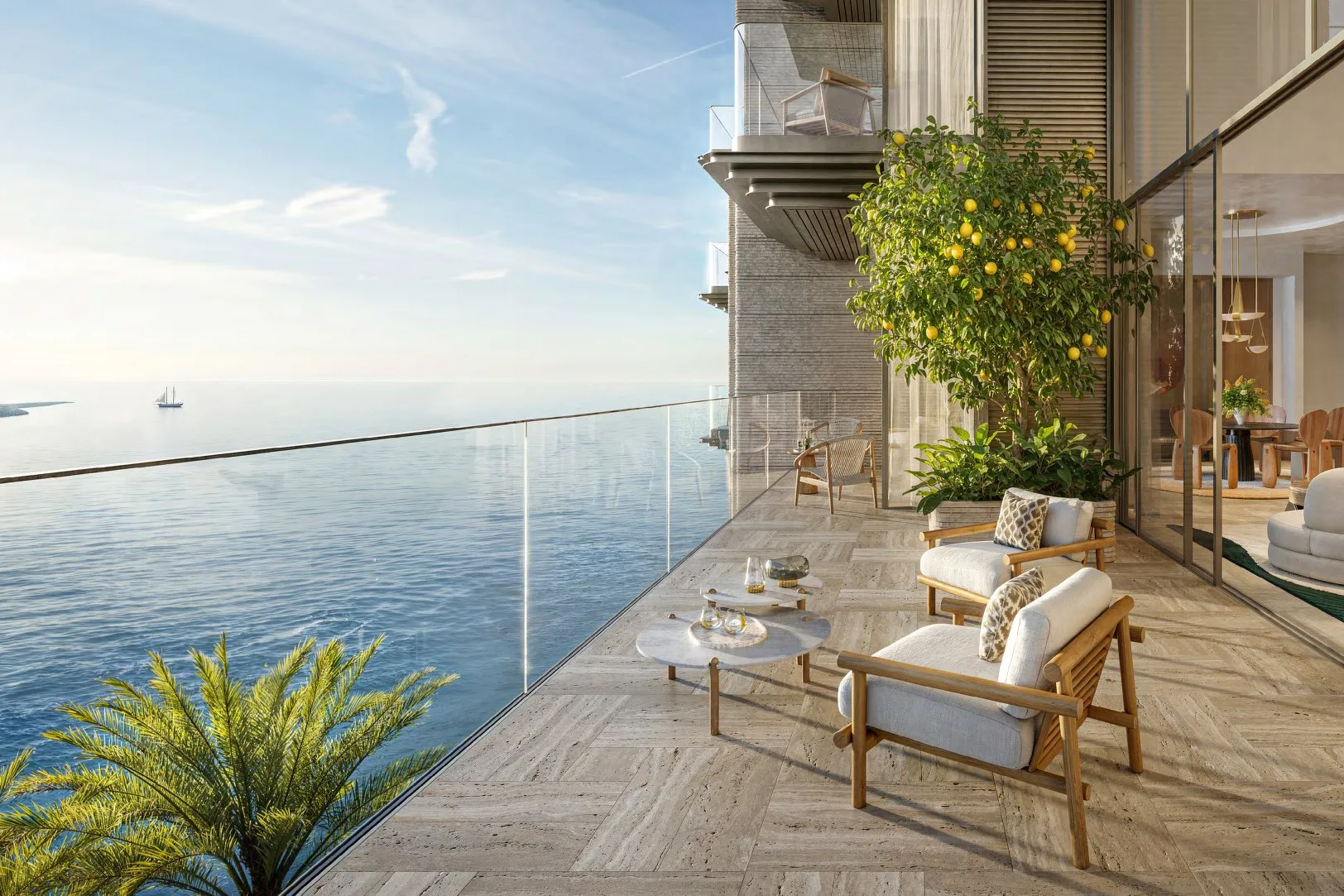 Duplex terrace with lemon tree and armchairs above the open sea